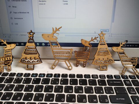 Laser Cut Deer Christmas Tree Ornaments Free Vector