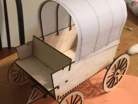 Laser Cut Covered Wagon Free Vector