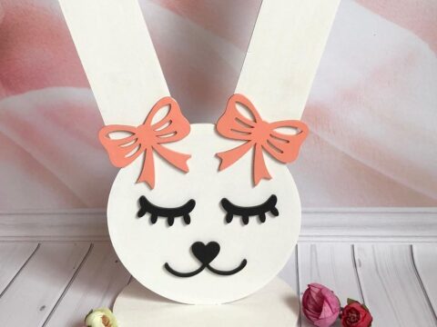Laser Cut Bunny Rubber Bands And Hairpins Stand Free Vector
