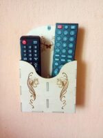 Laser Cut Wall Mounted Remote Control Holder Free Vector