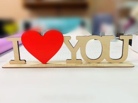 Laser Cut I Love You  Wooden Letters With Red Heart Shape On Stand Free Vector
