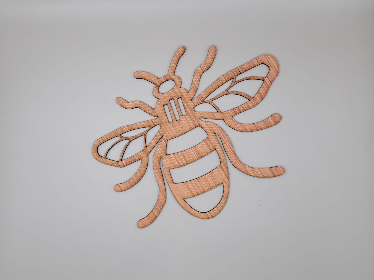 Laser Cut Wooden Bee Shape For Crafts Free Vector