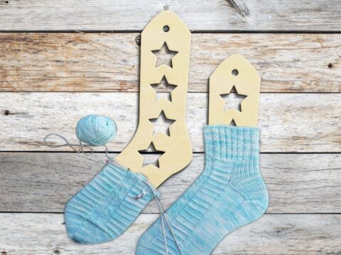 Laser Cut Wooden Sock Blockers With Stars Free Vector