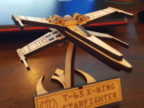 Laser Cut Small X-Wing Fighter with Stand Free Vector