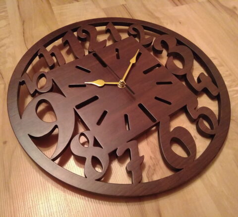 Laser Cut Unique Wooden Wall Clock Free Vector