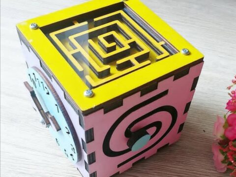 Laser Cut Busy Box Toy For Kids Free Vector