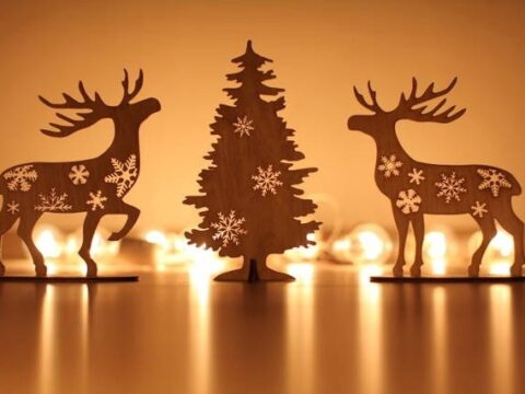 Laser Cut Christmas Tree And Deer Decorations Free Vector